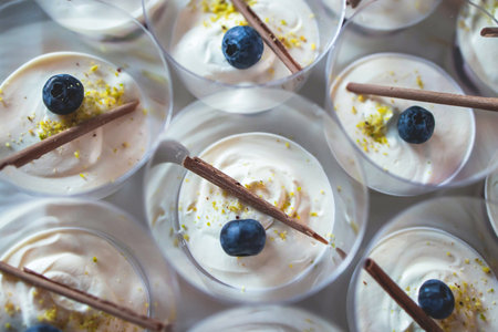 Set of coffee break in a hotel during conference meeting, with tea and coffee catering, decorated banquet table with variety of different desserts, pastry and bakery, with croissants and cookiesの写真素材