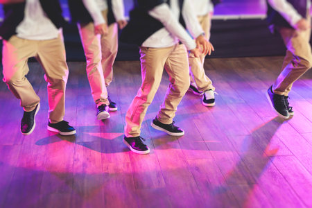 Group of hip-hop dancers performance on a stage, modern contemporary street dance with break dancing...