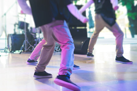 Group of hip-hop dancers performance on a stage, modern contemporary street dance with break dancing...