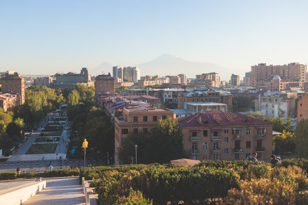 Yerevan, Armenia, beautiful super-wide angle panoramic view of Yerevan with Mount Ararat, cascade complex, mountains and scenery beyond the city, sunny dayの写真素材