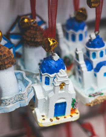 View of traditional tourist souvenirs and gifts from Athens, Attica, Greece with fridge magnets with text "Greece", "Athens" and key ring keychain, in a local vendor souvenir shop in Monastirakiの写真素材
