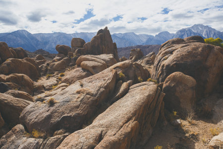 View of Alabama Hills, famous filming location rock formations near the eastern slope of Sierra Nevada, Owens Valley, west of Lone Pine in Inyo County, Inyo National Forest, California, United States.の写真素材