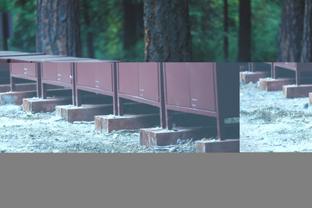 Row line of bear proof food metal storage lockers installed near camping campground in Yosemite...