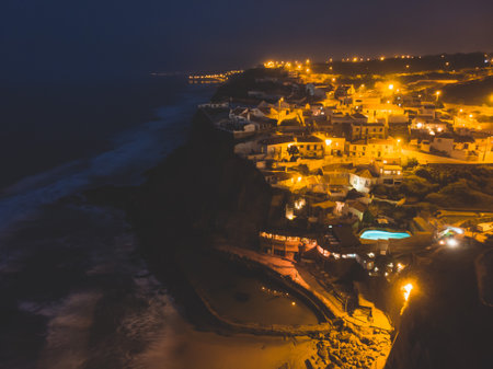 Aerial view of Azenhas Do Mar, municipality of Sintra, a seaside village on the Portuguese coast northwest of Lisbon, Portugal, shot from drone, with Atlantic Ocean viewの写真素材