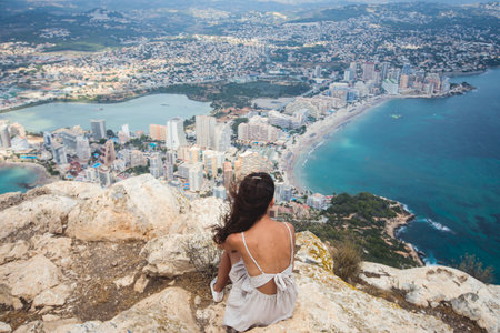 View of Calpe Calp town with Penon de Ifach mountain during the hiking to Penyal d'Ifac Natural Park, Marina Alta, province of Alicante, Valencian Community, Spainの写真素材