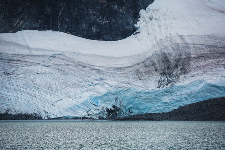 View of Galdhopiggen mountain, the highest peak and tallest mountain in Norway, Scandinavia and Northern Europe, he municipality of Lom (in Oppland), in the Jotunheimen national park mountain area.の写真素材