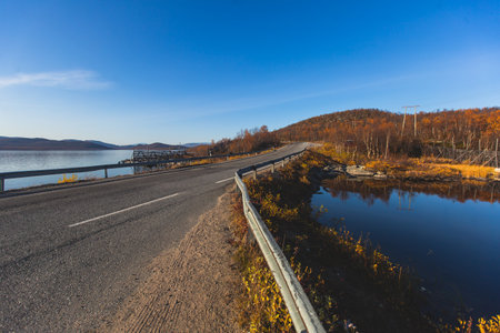 View of Kilpisjarvi village, with Saana mountain, Lake KilpisjÃ¤rvi, EnontekiÃ¶ municipality, Lapland, Finland, the very northwesternmost point of Finland, autumn fall viewの写真素材