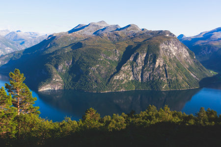 Hiking in Norway, classic norwegian scandinavian summer mountain landscape view with mountains,...