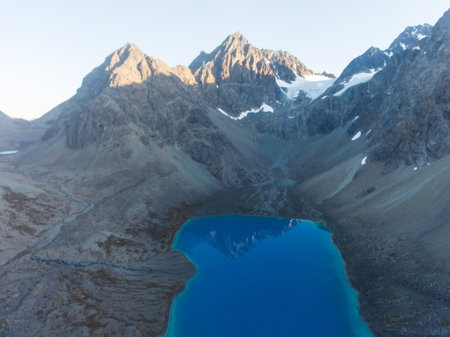Beautiful wide view of Blavatnet - the norwegian glacial Blue Lake in Northern Norway, views of the Lyngen Alpsの写真素材