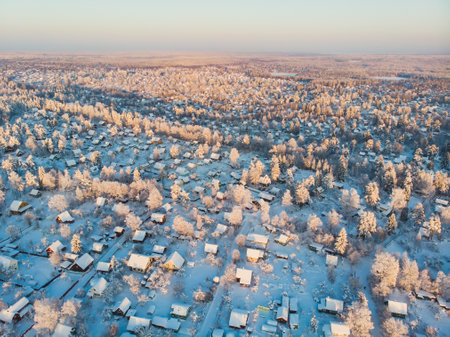 Winter view of russian country suburban village settlement, russian village, aerial sunny drone shot, near Saint-Petersburgの写真素材