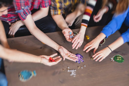 Process of playing board game and having fun with friends and family, board game concept, hand playing and roll the diceの写真素材