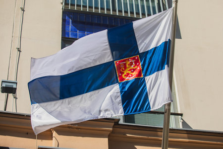 Waving flag of Finland and European Union flag hanging on the Finnish institutions and...