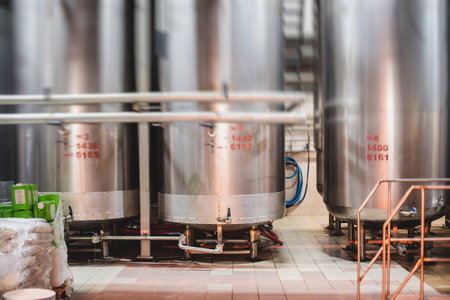 Interior of distillery winery brewery equipment, inside wine factory, process of alcohol liquor...