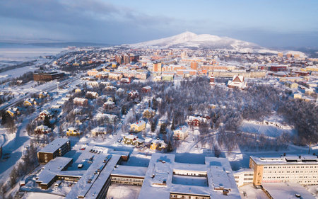 Aerial winter view of Kiruna, the northernmost town in Sweden, province of Lapland, winter sunny picture shot from droneの写真素材