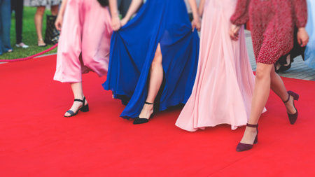 Red carpet with ropes and golden barriers on luxury party entrance, cinema premiere film festival...