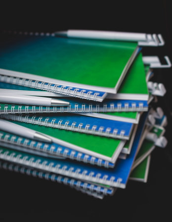 Gift bag package for conference participants before start, with a leaflet handout, notebook notepad, mug, pen, pencil, corporate gifts and souvenirs for employees of the company, office gift givingの写真素材