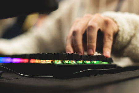 Cyber sport e-sports tournament, team of professional gamers, hands on a mouse and keyboard, players...