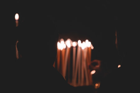 Greek Orthodox Christian Easter ceremony procession, divine worship service, worshipers hold candles, parishioners during an Easter vigil mass in a Cathedral, Athens, Attica, Greece, divine liturgyの写真素材