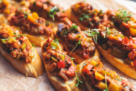 Beautifully decorated banquet catering table, with variety of with different food snacks appetizers on corporate birthday party event or wedding celebration, canape, salad, delicatessen settingの写真素材