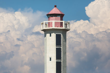 Summer aerial view of Povorotny lighthouse, Vikhrevoi island, Gulf of Finland, Vyborg bay, Leningrad oblast, Russia, sunny day with blue sky, lighthouses of Russia travelの写真素材