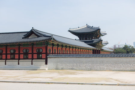 Gyeongbokgung Palace, Seoul, Jongno District, South Korea, in a spring sunny day, exterior view of main Korean royal palace in Cherry Blossom season, with Bugaksan mountain in the backgroundの写真素材