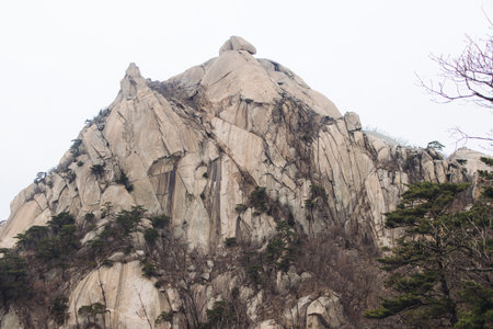 Bukhansan National Park, Seoul, Gyeonggi-do, South Korea, spring landscape view during hike to Baegundae summit peak, process of trekking and climbing to Bukhan mountain, travel and hiking in Koreaの写真素材