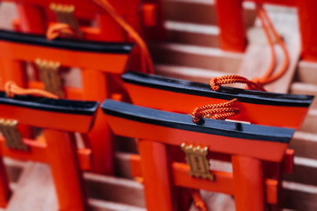 Fushimi Inari Taisha Shrine, Fushimi-ku, Kyoto Prefecture, Kansai region, Kyoto, Japan, Shinto shrine, mountain way with red torii gates tunnel, wooden torii path, fox sculptures, travel to Japanの写真素材