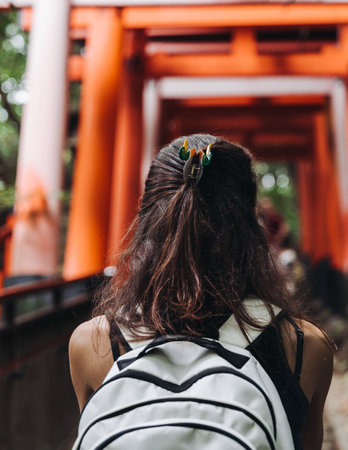 Fushimi Inari Taisha Shrine, Fushimi-ku, Kyoto Prefecture, Kansai region, Kyoto, Japan, Shinto shrine, mountain way with red torii gates tunnel, wooden torii path, fox sculptures, travel to Japanの写真素材
