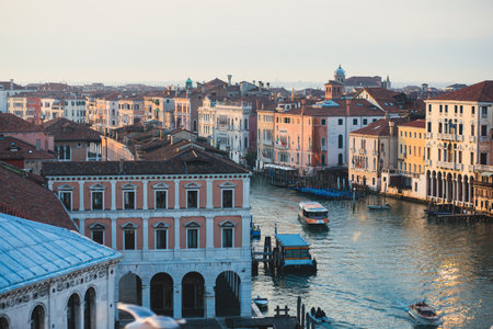 Venice panorama, Veneto, Italy, beautiful aerial panoramic view of Venetian Grand Channel Canal with gondolas, rooftops, skyline and scenery beyond the city, in a summer sunny day, travel to Veneziaの写真素材
