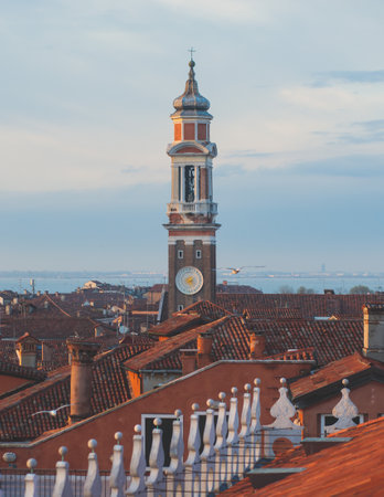 Venice panorama, Veneto, Italy, beautiful aerial panoramic view of Venetian Grand Channel Canal with gondolas, rooftops, skyline and scenery beyond the city, in a summer sunny day, travel to Veneziaの写真素材