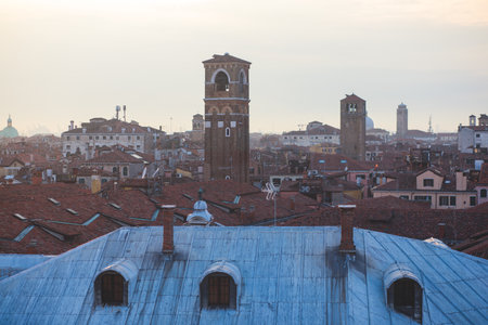Venice panorama, Veneto, Italy, beautiful aerial panoramic view of Venetian Grand Channel Canal with gondolas, rooftops, skyline and scenery beyond the city, in a summer sunny day, travel to Veneziaの写真素材