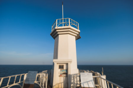 Jeju-do, Seopjikoji cape landscape with lighthouse and sea, east coast of Jeju Island, South Korea, Seongsan-ri, Seogwipo, Jeju Province view in a sunny day, with sea and cliffsの写真素材