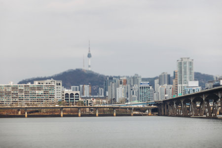 Seoul panoramic view during Hangang river boat cruise, South Korea, with Yeouido Hangang Park and Mapo bridge, scenery beyond the city, Yeongdeungpo District, Gyeonggi-do province, Republic of Koreaの写真素材