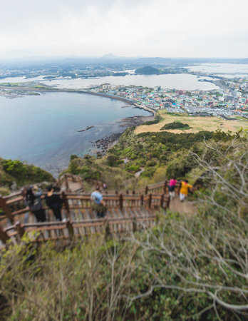 Jeju-do, Seongsan Ilchulbong landscape, volcanic tuff cone, Sunrise peak, Jeju Island, South Korea, Seongsan-ri, Seogwipo, Jeju Province landscape view in a sunny day, with sea, cliffs hiking trailの写真素材