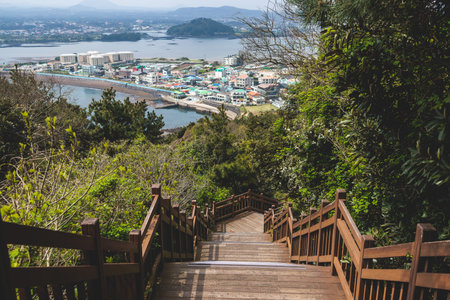 Jeju-do, Seongsan Ilchulbong landscape, volcanic tuff cone, Sunrise peak, Jeju Island, South Korea, Seongsan-ri, Seogwipo, Jeju Province landscape view in a sunny day, with sea, cliffs hiking trailの写真素材