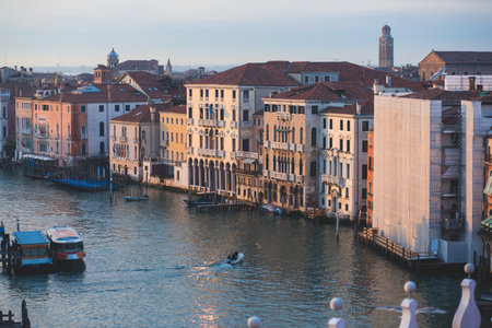 Venice panorama, Veneto, Italy, beautiful aerial panoramic view of Venetian Grand Channel Canal with gondolas, rooftops, skyline and scenery beyond the city, in a summer sunny day, travel to Veneziaの写真素材