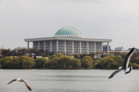 Seoul panoramic view during Hangang river boat cruise, South Korea, with Yeouido Hangang Park and Mapo bridge, scenery beyond the city, Yeongdeungpo Districtの写真素材