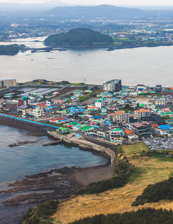 Jeju-do, Seongsan Ilchulbong landscape, volcanic tuff cone, Sunrise peak, Jeju Island, South Korea, Seongsan-ri, Seogwipo, Jeju Province landscape view in a sunny day, with sea, cliffs hiking trailの写真素材