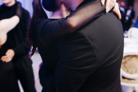 High school graduates dancing on prom, waltz and classical ball slow dance in dresses and suits on school graduation party, boys and girls ballroom dancers, couples dance quadrille, polonaiseの写真素材