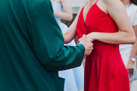 High school graduates dancing on prom, waltz and classical ball slow dance in dresses and suits on school graduation party, boys and girls ballroom dancers, couples dance quadrille, polonaiseの写真素材