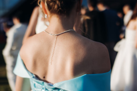 High school graduates dancing on prom, waltz and classical ball slow dance in dresses and suits on...