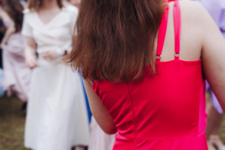 High school graduates dancing on prom, waltz and classical ball slow dance in dresses and suits on school graduation party, boys and girls ballroom dancers, couples dance quadrille, polonaiseの写真素材