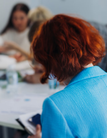 Audience team on master class seminar, working together during contest competition in the auditorium class, corporate workshop, company coworkers and colleagues listen to lecturer on a conferenceの写真素材