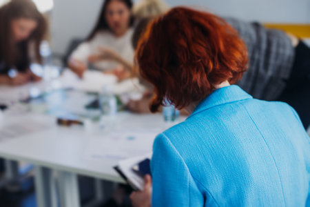 Audience team on master class seminar, working together during contest competition in the auditorium class, corporate workshop, company coworkers and colleagues listen to lecturer on a conferenceの写真素材
