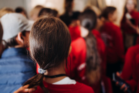 Group of kids children on excursion in a museum gallery, school pupils and students tour with guide,...