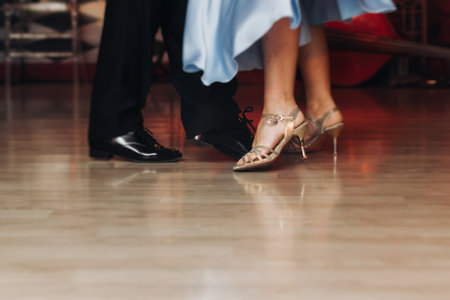 Couples dancing traditional latin argentinian dance milonga in the ballroom, tango salsa bachata...