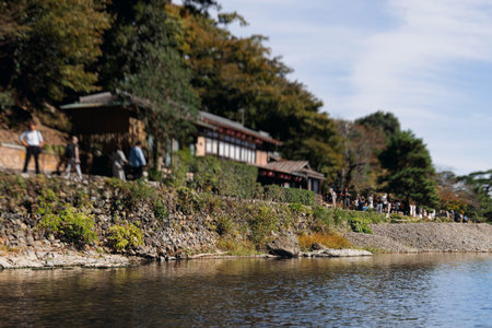 Arashiyama district panorama in western Kyoto, Japan, with boats and mountain Arashi, Togetsukyo...
