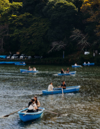Arashiyama district panorama in western Kyoto, Japan, with boats and mountain Arashi, Togetsukyo bridge, Katsura Hozu River, autumn fall landscape view, travel to Japan, Kansai region, Kyotoの写真素材