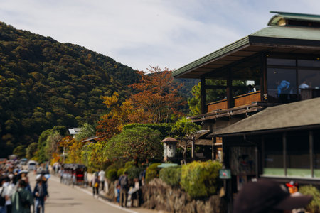 Arashiyama district panorama in western Kyoto, Japan, with boats and mountain Arashi, Togetsukyo bridge, Katsura Hozu River, autumn fall landscape view, travel to Japan, Kansai region, Kyotoの写真素材