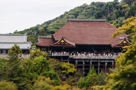 Kiyomizu-dera buddhist temple in Kyoto prefecture, Japan, Higashiyama ward, autumn fall view with mountains, Kyoto streets and skyline, shrine and pagoda, travel to Japan, Kansai regionの写真素材